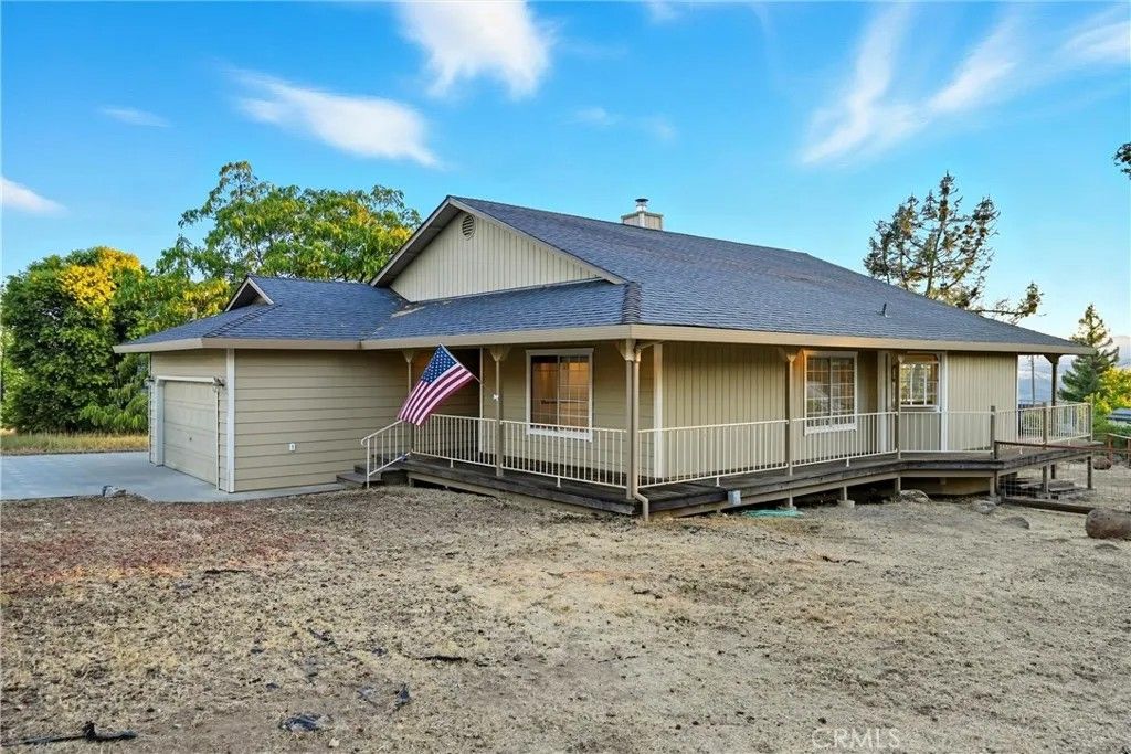 Photo of 19231 Ravenhill Road, Hidden Valley Lake, CA 95467 (MLS # LC26009343)