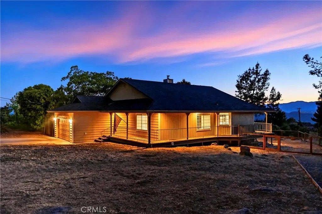 Photo of 19231 Ravenhill Road, Hidden Valley Lake, CA 95467 (MLS # LC26009343)