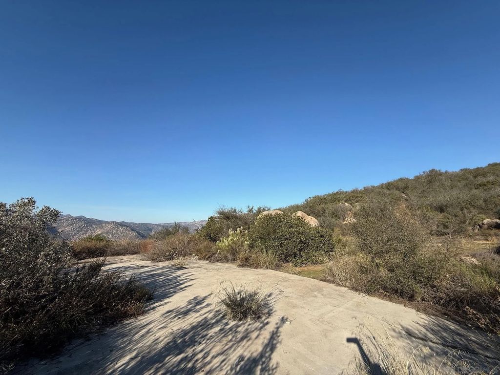 Photo of 12494 Buena Vida Rd, Lakeside, CA 92040 (MLS # 250045160)