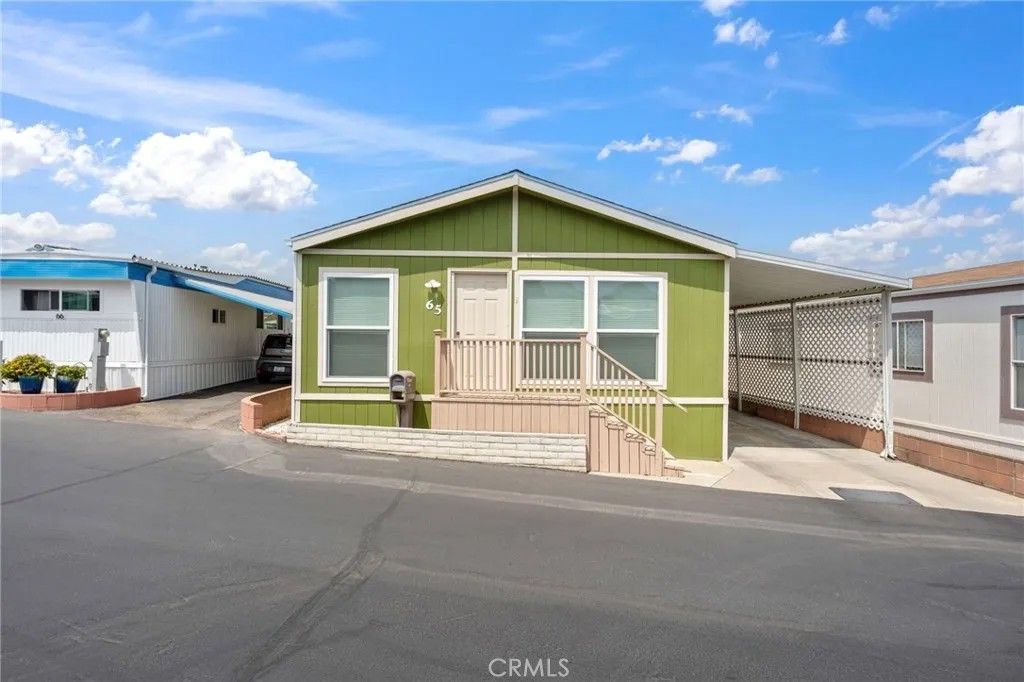 Photo of 65 Hummingbird Ln, Oceanside, CA 92057 (MLS # IV25183783)