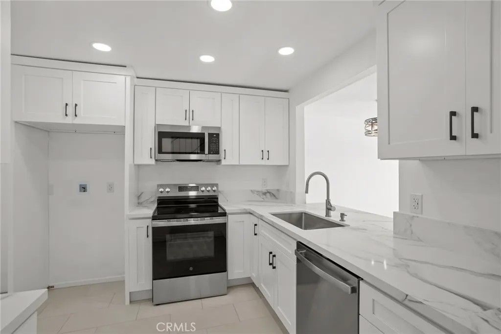 Photo of 4719 Knickerbocker Ln, Riverside, CA 92501 (MLS # OC26071145)