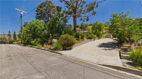 Photo of 11246 Denivelle Place, Tujunga, CA 91042 (MLS # GD26152616)