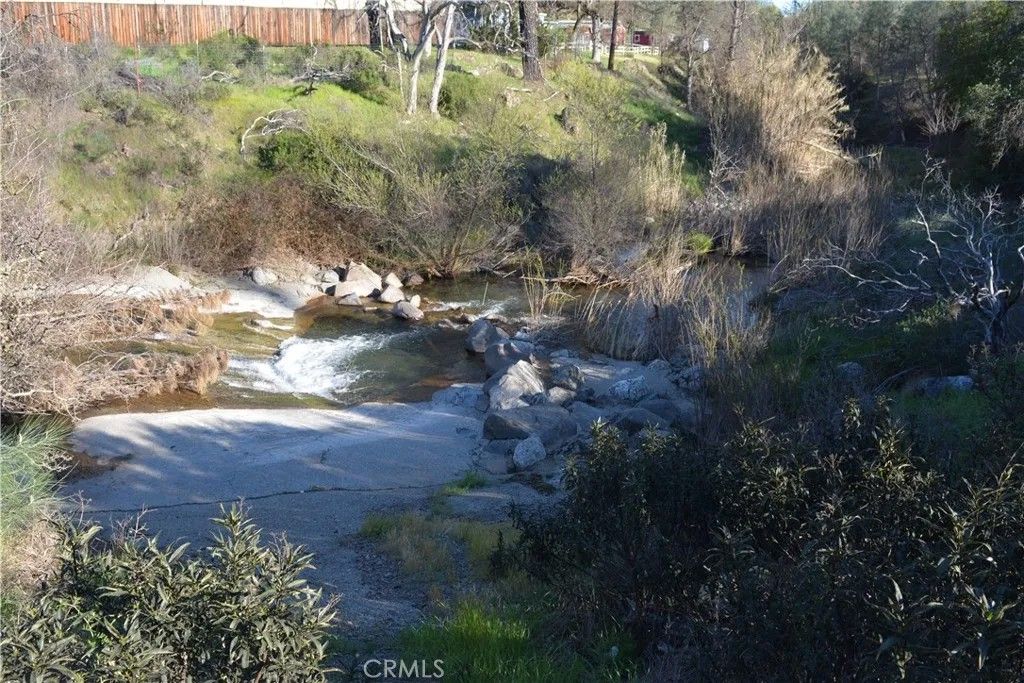 Photo of 3515 Spring Valley Rd, Clearlake Oaks, CA 95423 (MLS # LC26056207)