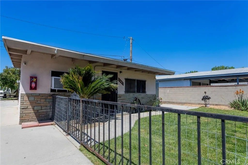 Photo of 7411 Ira Avenue, Bell Gardens, CA 90201 (MLS # PW26082964)
