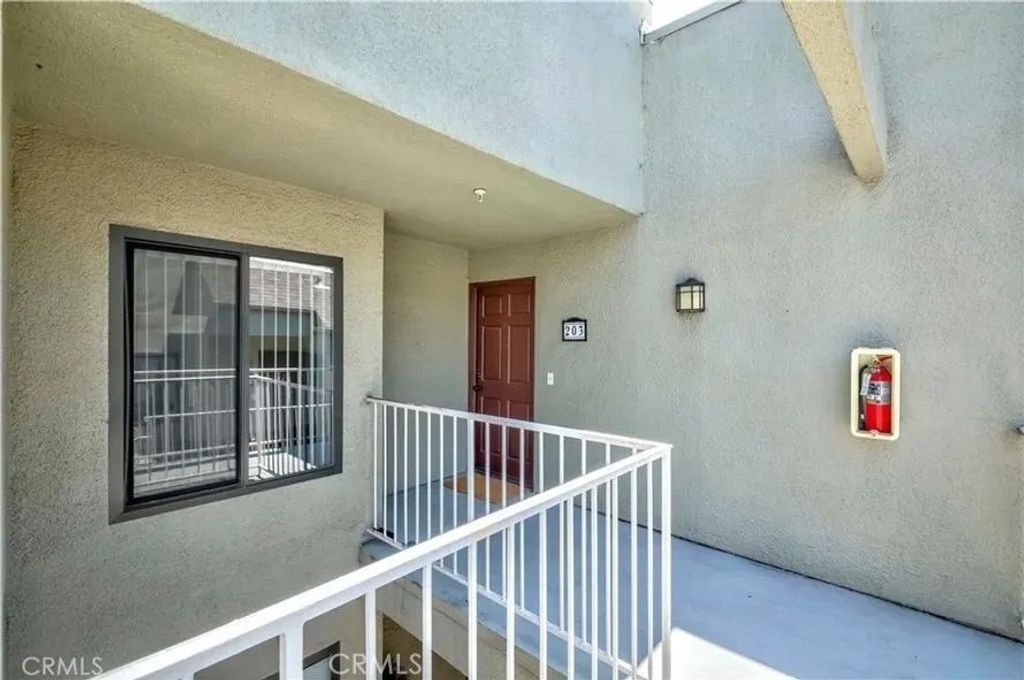 Photo of 17722 Sergio Cir #203, Huntington Beach, CA 92647 (MLS # OC25272166)