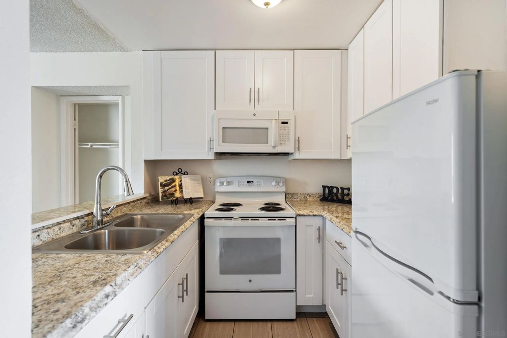 Photo of 4060 Huerfano Ave Unit 126 Ave, San Diego, CA 92117 (MLS # 260002967)