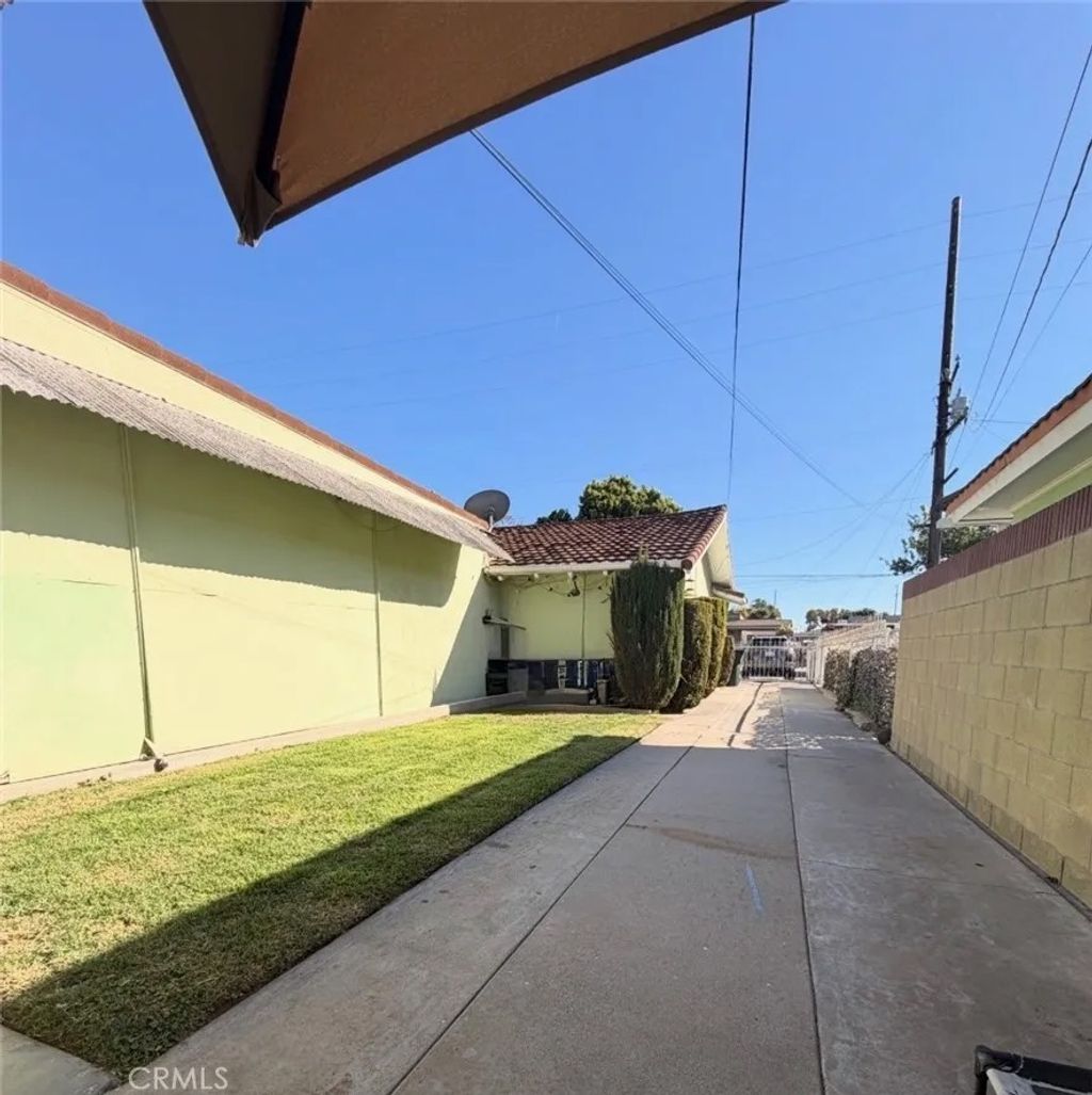 Photo of 9615 Walnut St, Bellflower, CA 90706 (MLS # RS26062016)