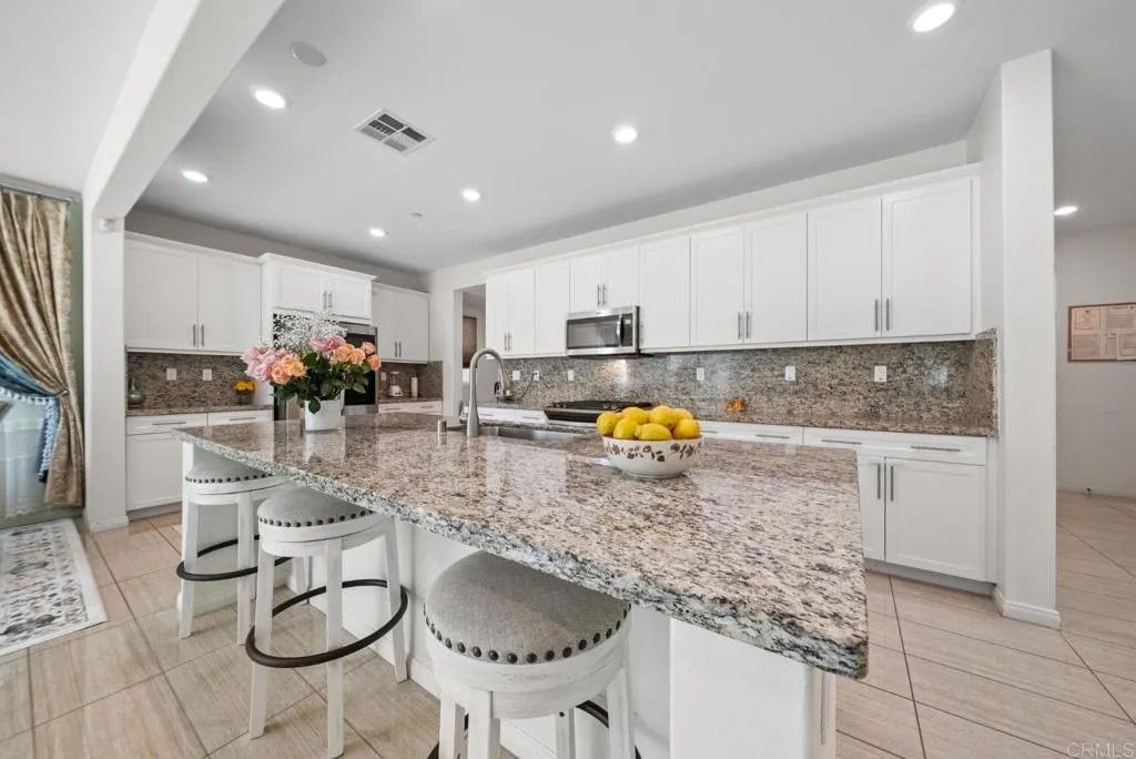 Photo of 1251 S Magnolia Avenue, El Cajon, CA 92020 (MLS # PTP2604570)
