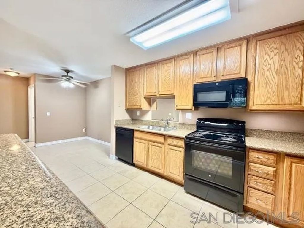 Photo of 1845 Bayview Heights Dr #103, San Diego, CA 92105 (MLS # 250045332)