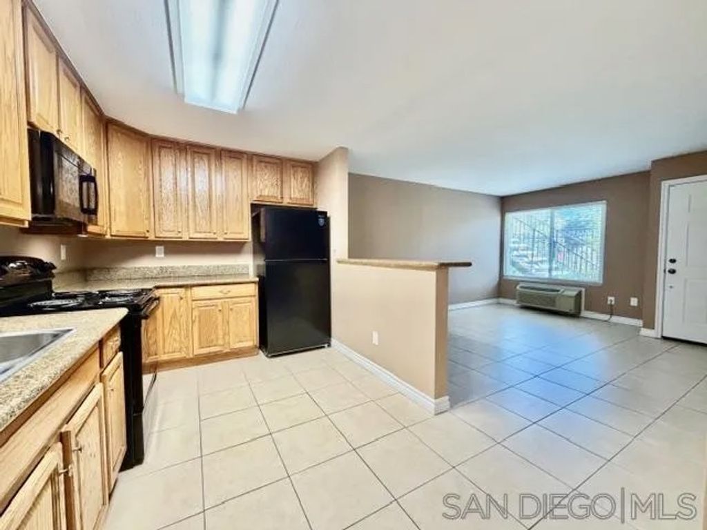 Photo of 1845 Bayview Heights Dr #103, San Diego, CA 92105 (MLS # 250045332)