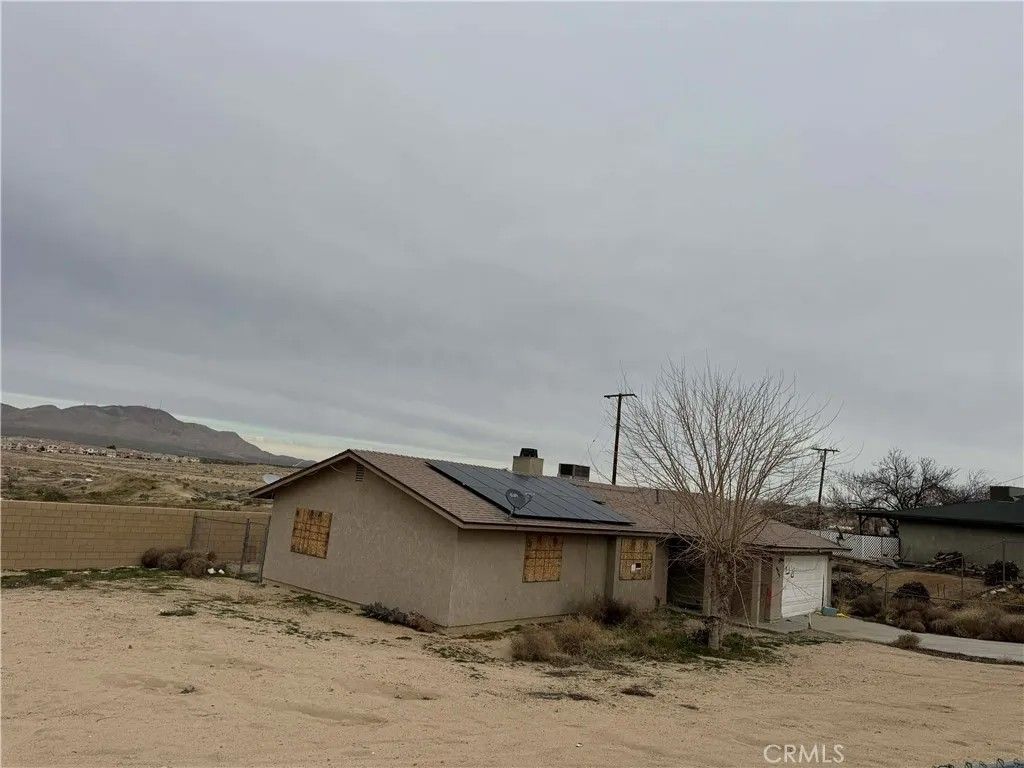 Photo of 16085 Village Dr, Victorville, CA 92394 (MLS # CV26015342)