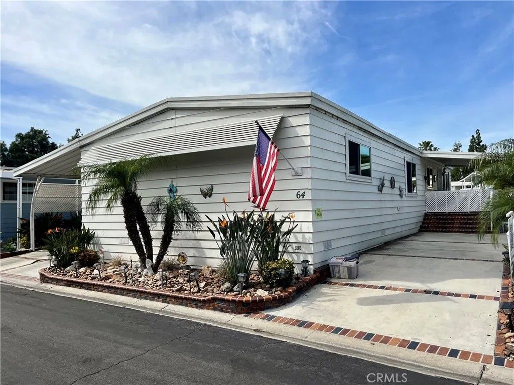 Photo of 24001 Muirlands Blvd #64, Lake Forest, CA 92630 (MLS # OC26021192)