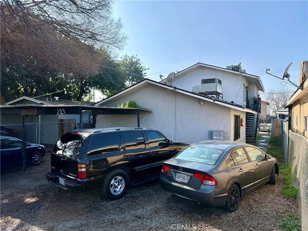 Photo of 329 N Diana St, Fresno, CA 93701 (MLS # SR26038048)