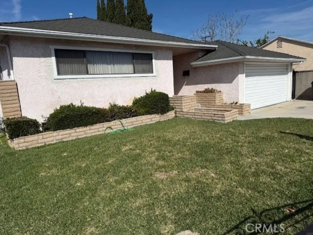 Photo of 10613 Dolan Avenue, Downey, CA 90241 (MLS # DW26038075)