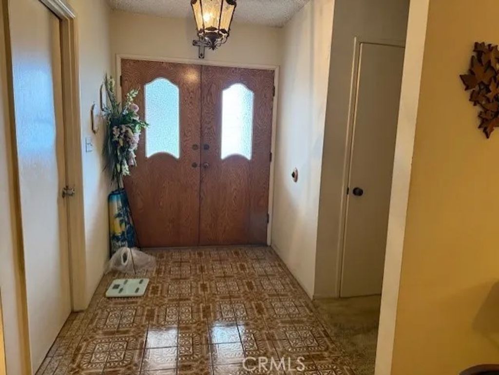 Photo of 10613 Dolan Avenue, Downey, CA 90241 (MLS # DW26038075)