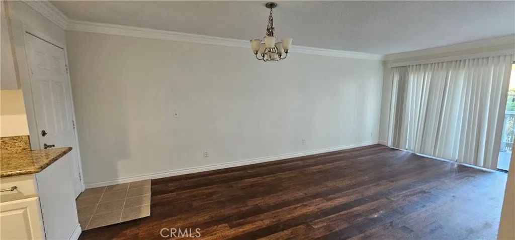 Photo of 1085 Circle City Drive #202, Corona, CA 92879 (MLS # CV26017321)