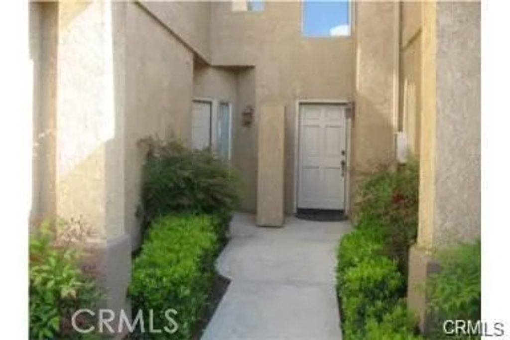 Photo of 2130 Almeria Street #102, Corona, CA 92879 (MLS # TR26043307)