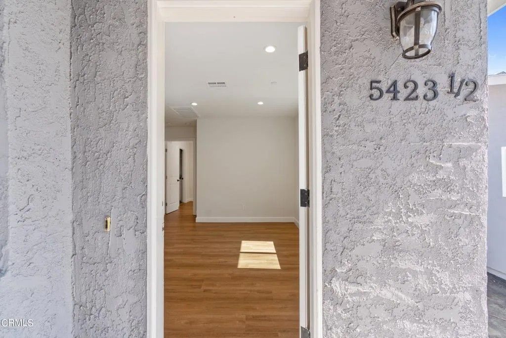 Photo of 5423 Ash Street, Los Angeles, CA 90042 (MLS # P1-26697)