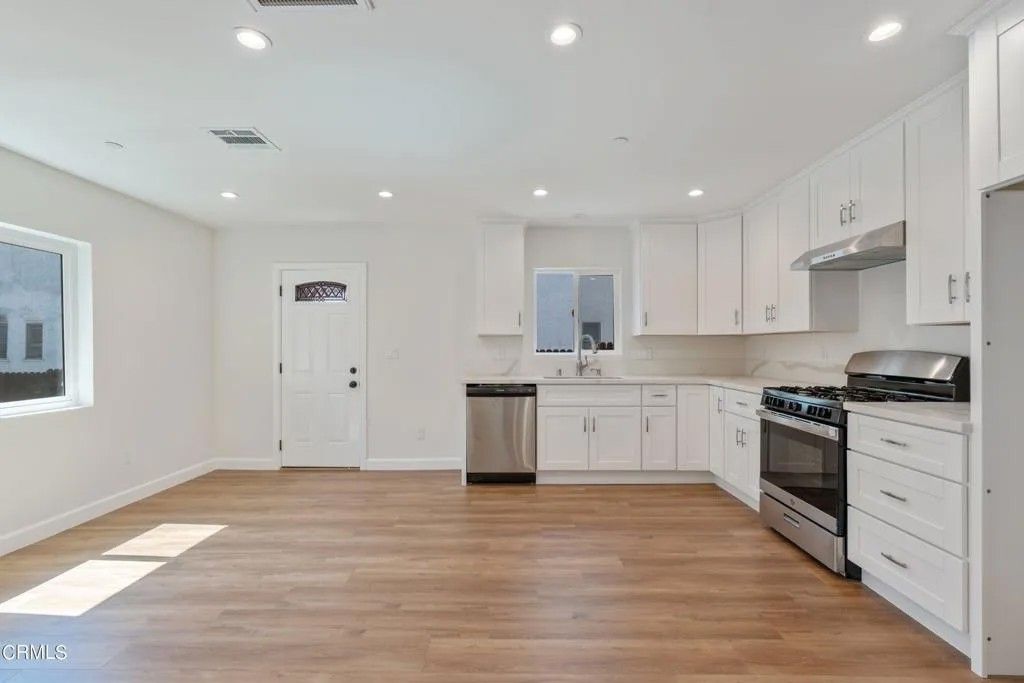 Photo of 5423 Ash Street, Los Angeles, CA 90042 (MLS # P1-26697)