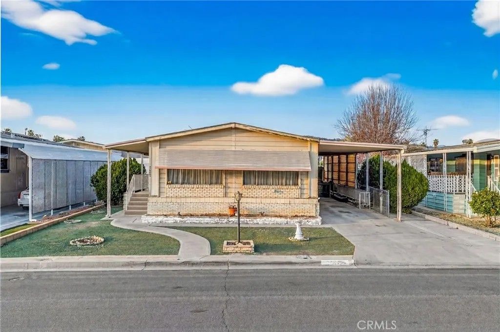 Photo of 30856 Palmetto Palm Avenue, Homeland, CA 92548 (MLS # SW26043483)