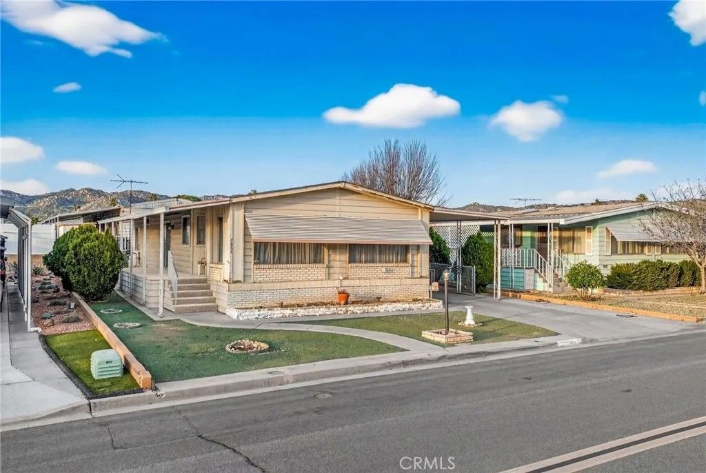 Photo of 30856 Palmetto Palm Avenue, Homeland, CA 92548 (MLS # SW26043483)