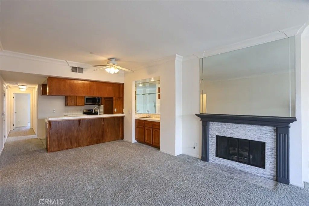 Photo of 11630 Warner Avenue #614, Fountain Valley, CA 92708 (MLS # OC26071396)