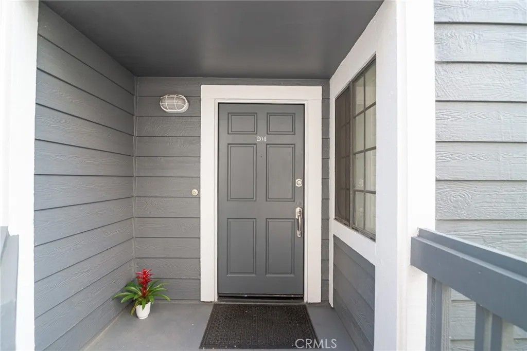 Photo of 8192 Sandcove Cir #204, Huntington Beach, CA 92646 (MLS # OC26074566)