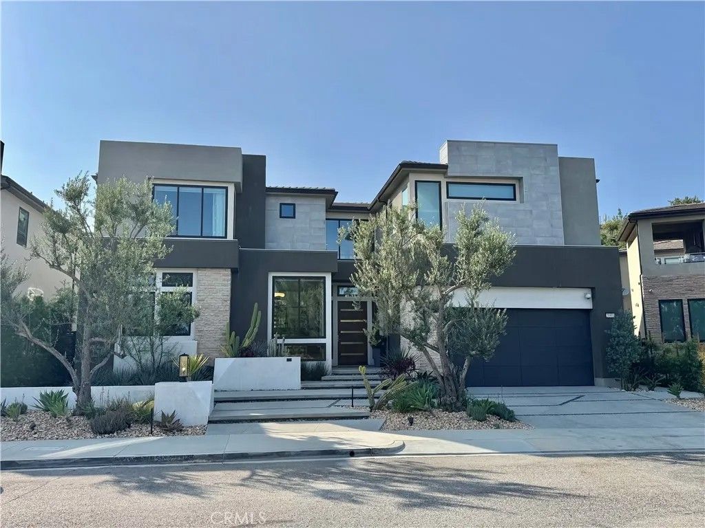 Photo of 20401 W Aberdeen Lane, Porter Ranch, CA 91326 (MLS # OC26002972)