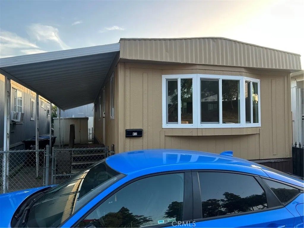 Photo of 6656 E Rosecrans Ave #N12, Paramount, CA 90723 (MLS # DW25277634)