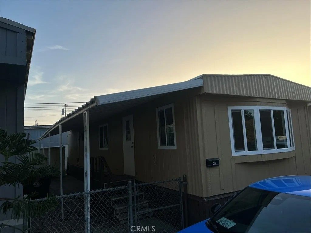 Photo of 6656 E Rosecrans Ave #N12, Paramount, CA 90723 (MLS # DW25277634)