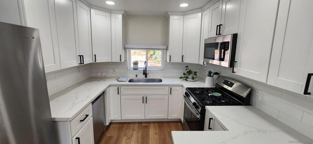 Photo of 8587 Alpine Ave, La Mesa, CA 91941 (MLS # 250043964)