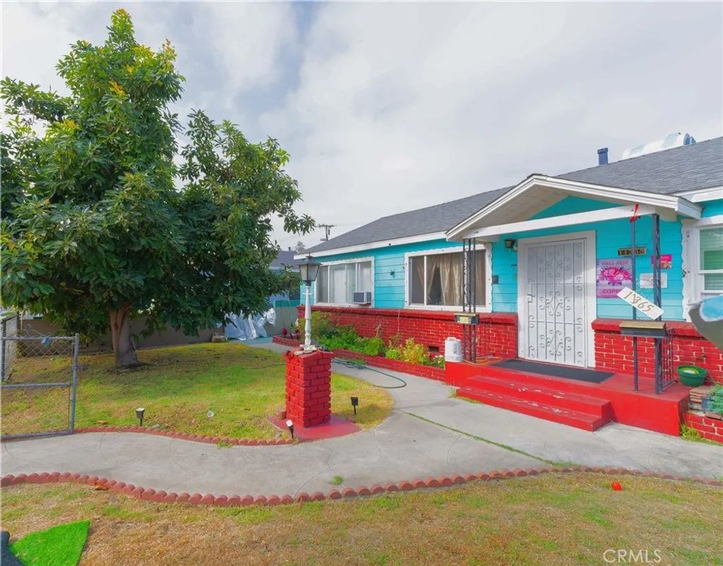 Photo of 11363 Virginia Avenue, Lynwood, CA 90262 (MLS # DW26007627)