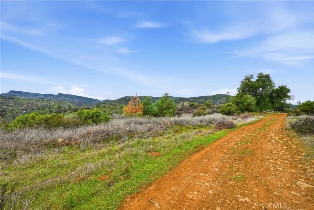 Photo of 850 Old Long Valley, Clearlake Oaks, CA 95423 (MLS # LC26020273)