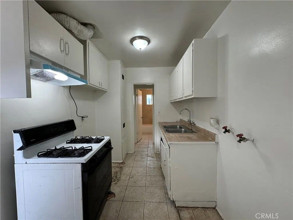 Photo of 591 E 6th Street, Pomona, CA 91766 (MLS # WS26058289)