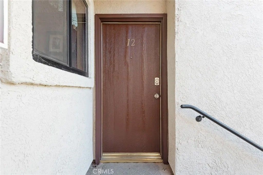Photo of 8327 Vineyard Avenue #12, Rancho Cucamonga, CA 91730 (MLS # CV26007327)