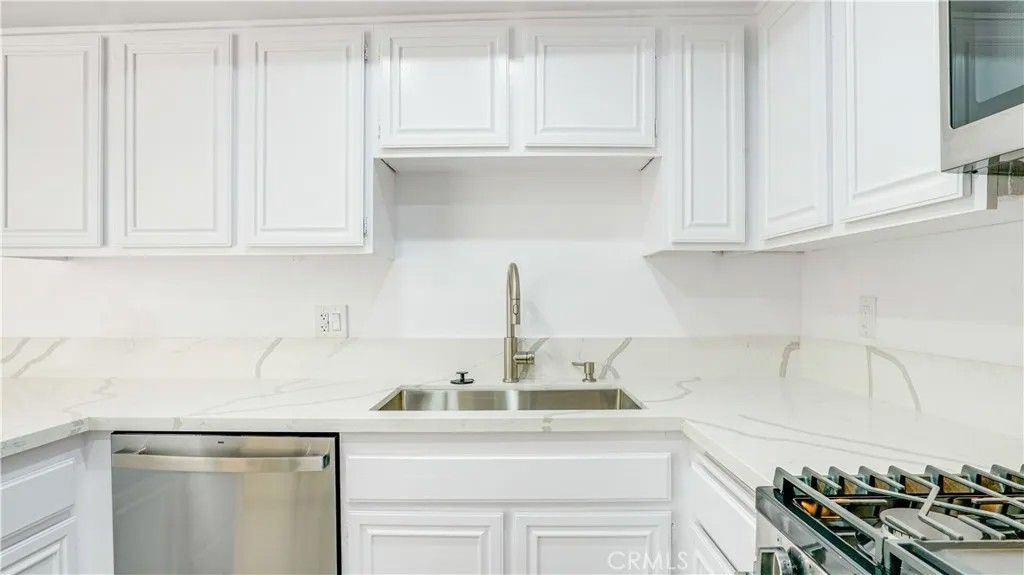 Photo of 8565 Independence Avenue #7, Canoga Park, CA 91304 (MLS # OC25247558)