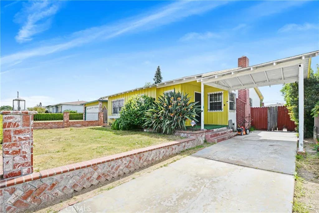 Photo of 1122 W 124th Street, Los Angeles, CA 90044 (MLS # RS26124927)