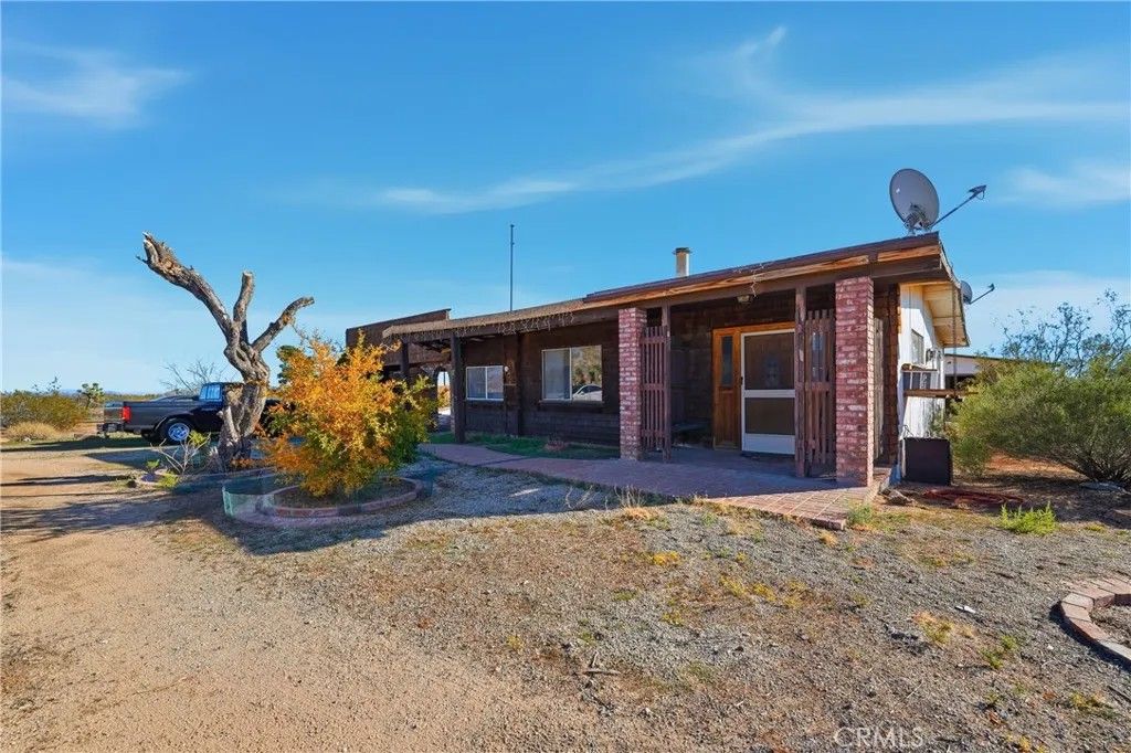 Photo of 3535 Condalia Ave, Yucca Valley, CA 92284 (MLS # DW25248456)