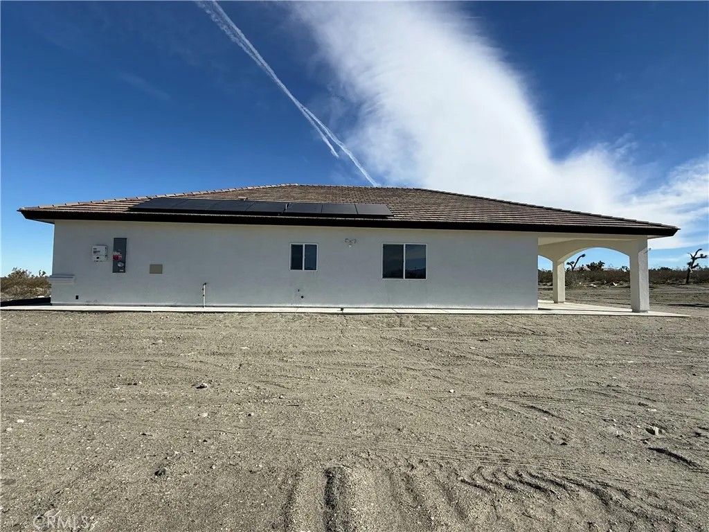 Photo of 2115 Seville Pl, Pinon Hills, CA 92372 (MLS # DW26010061)