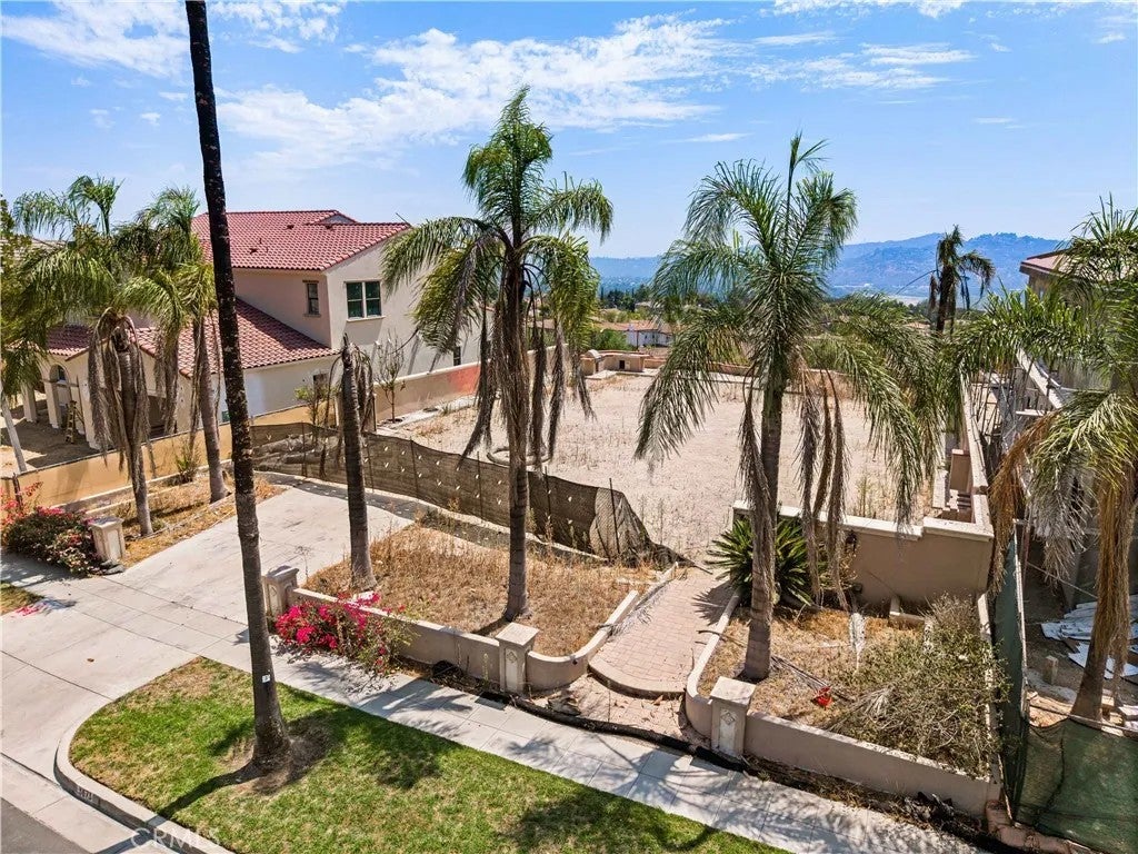 Photo of 3873 Lilac Canyon Ln, Altadena, CA 91001 (MLS # OC26175437)