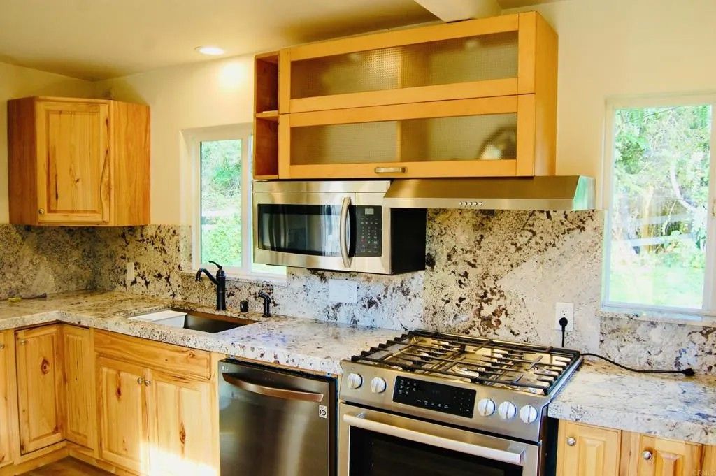 Photo of 736 Mar Vista Drive, Vista, CA 92081 (MLS # NDP2601051)