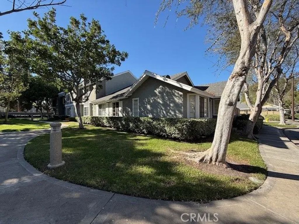 Photo of 63 Thicket, Irvine, CA 92614 (MLS # OC26023076)