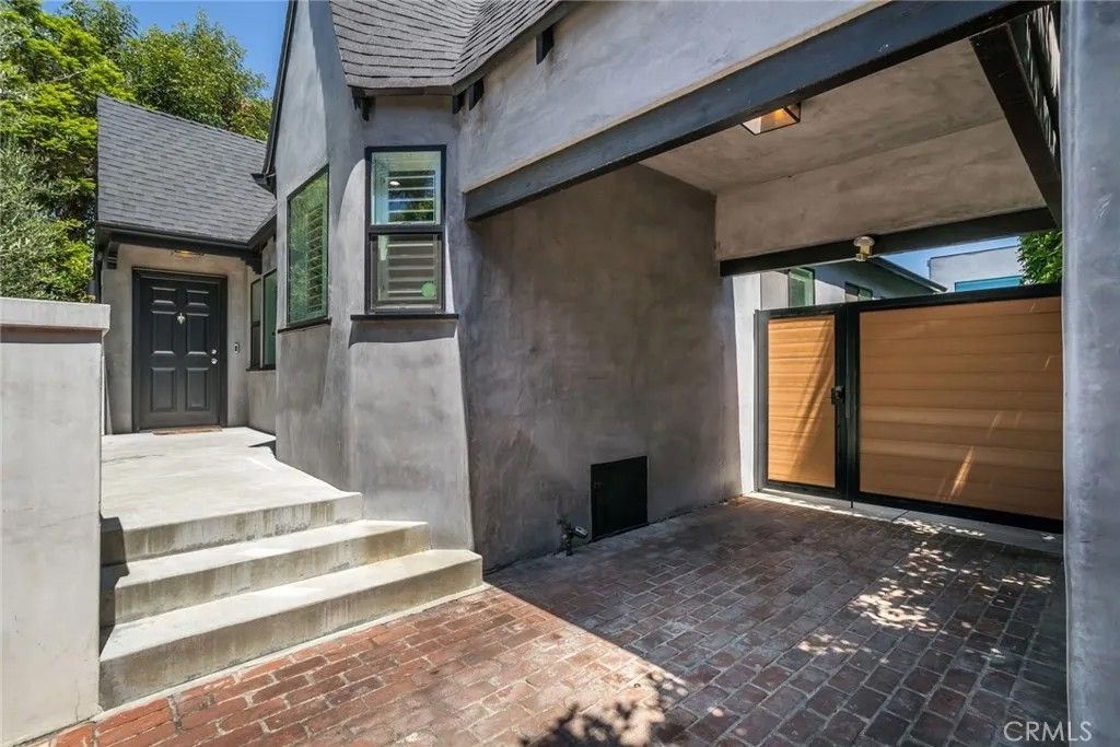 Photo of 1444 Stearns Drive, Los Angeles, CA 90035 (MLS # SR26080907)