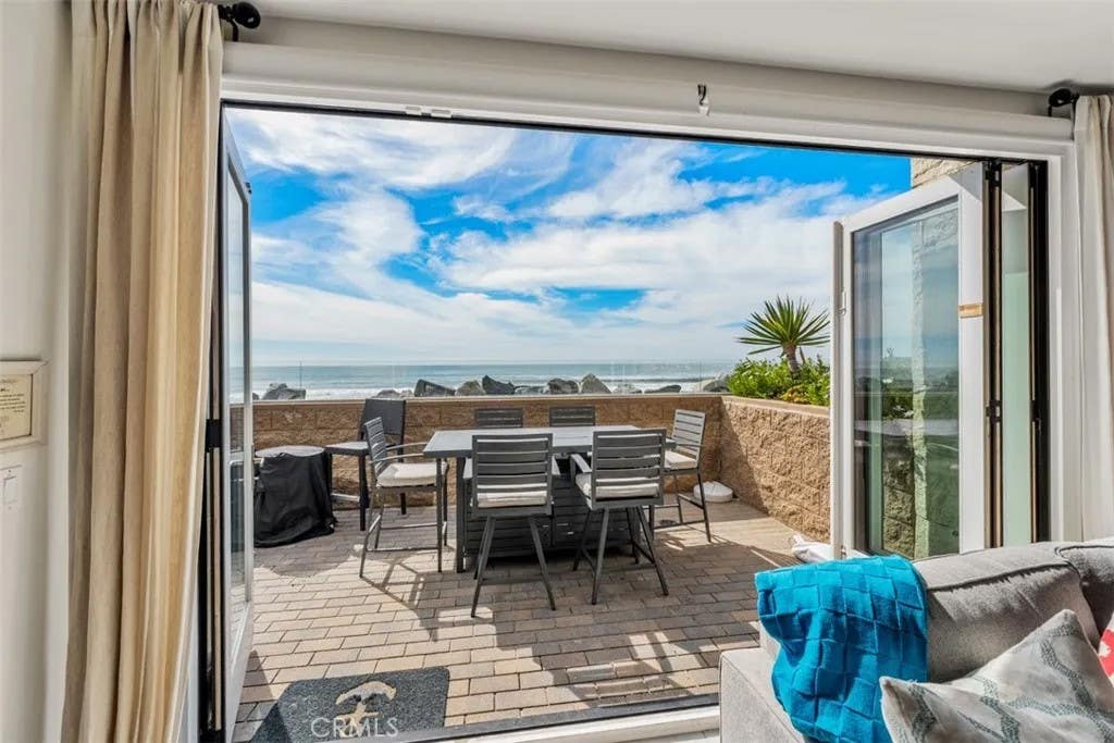 Photo of 700 S The Strand #106, Oceanside, CA 92054 (MLS # OC26081982)