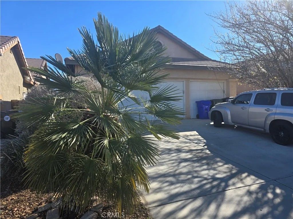 Photo of 13049 Nelliebell Drive, Victorville, CA 92392 (MLS # CV26011948)