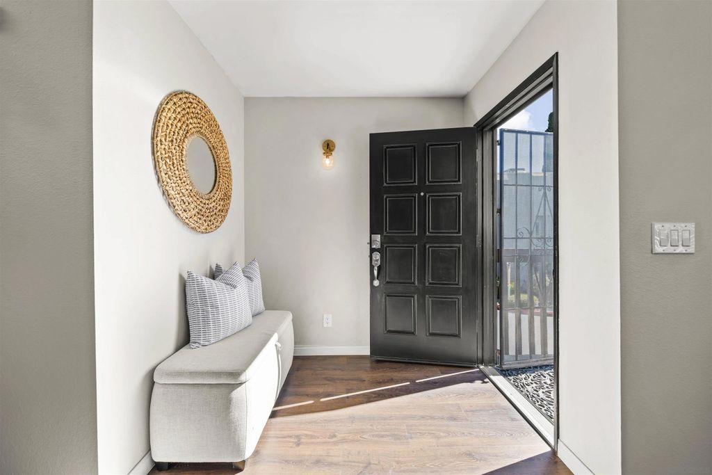 Photo of 6363 Rancho Mission Rd #8, San Diego, CA 92108 (MLS # 260004249)