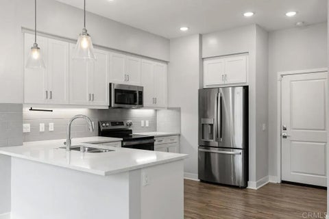 Photo of 135 Avenida Chapala #103, San Marcos, CA 92069 (MLS # NDP2606461)
