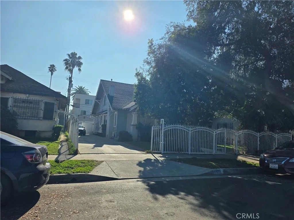 Photo of 1180 W 39th Place, Los Angeles, CA 90037 (MLS # OC25277748)