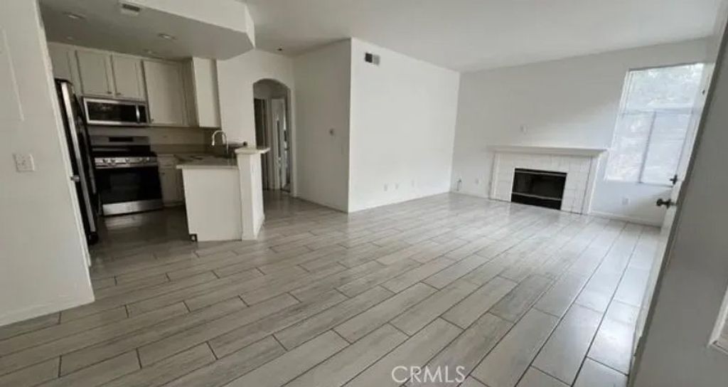 Photo of 19431 Rue De Valore #27B, Lake Forest, CA 92610 (MLS # OC26001049)