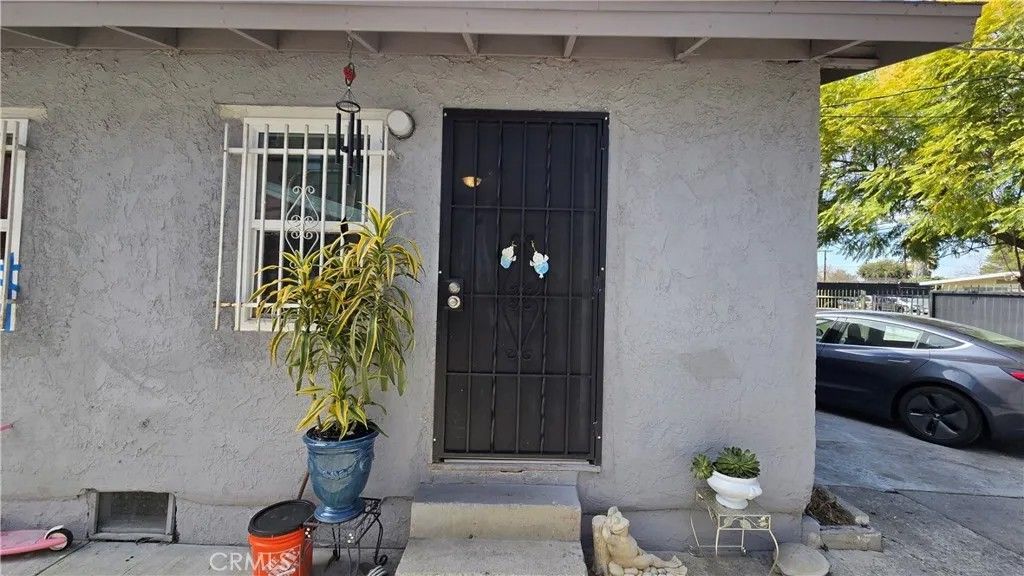 Photo of 1468 E 107th St, Los Angeles, CA 90002 (MLS # DW26047029)